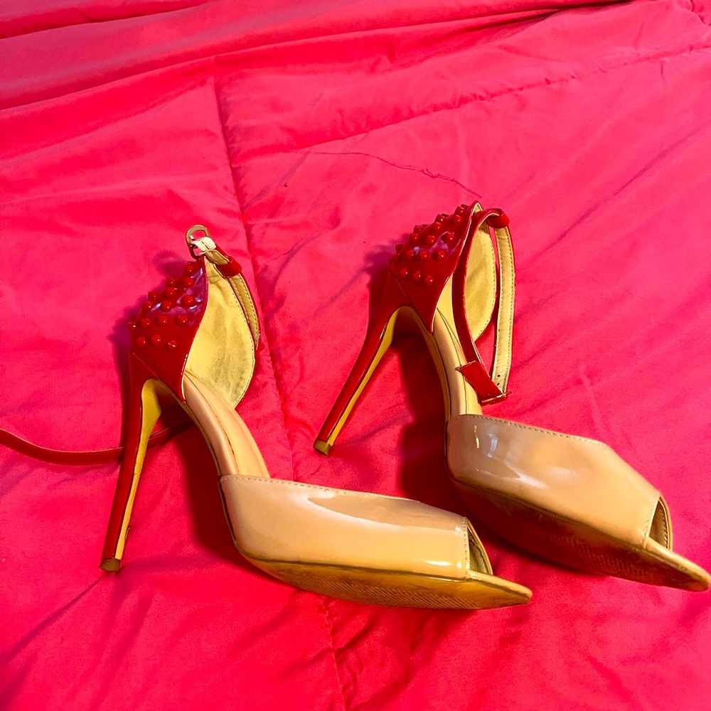 Size 11 Beige Patent Heels. Red Spiked back.